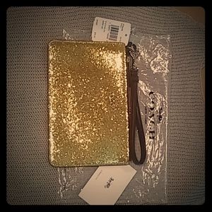 Gold glitter Coach wristlet